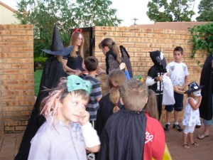 Handing out sweets to the kids